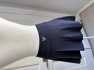 TNA TnAction Move Serve skirt NWT